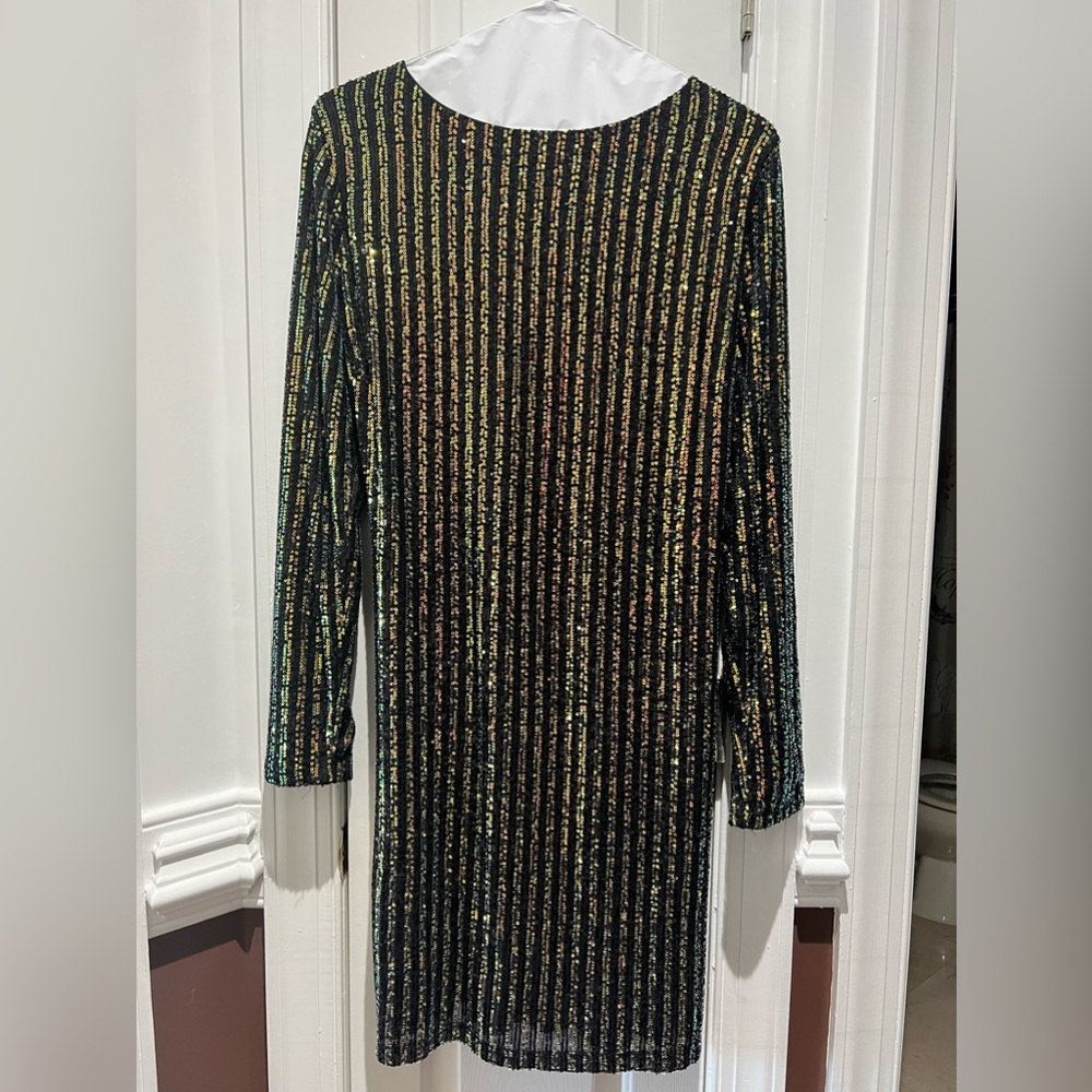 Sequin mini dress with back out.